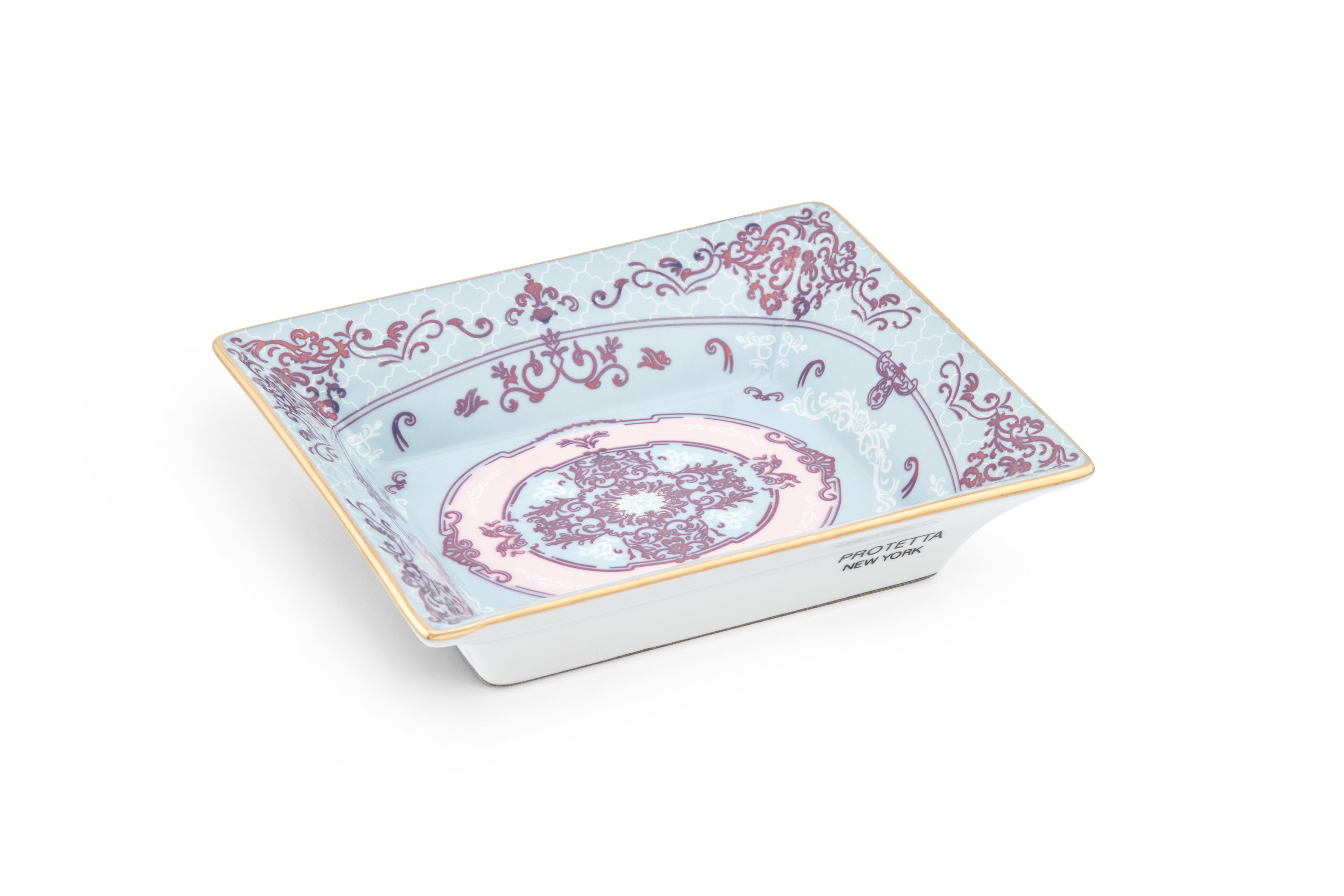 A miniature masterpiece, Sleek porcelain tray with rich gold borders, perfect for enhancing any room’s decor.
